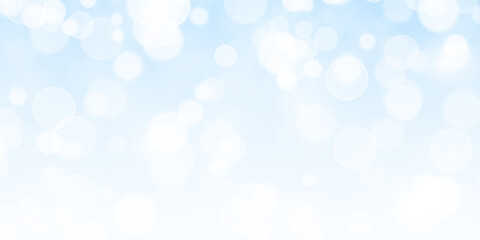 Fantasy shimmer bright star light with glistering stardust and confetti overlay. Abstract sparkle bokeh festive background with glowing dust particles in blue tones.