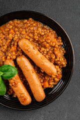 Sausage with lentils second course tasty snack fresh delicious gourmet food background on the table rustic top view copy space
