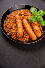 Sausage with lentils second course tasty snack fresh delicious gourmet food background on the table rustic top view copy space