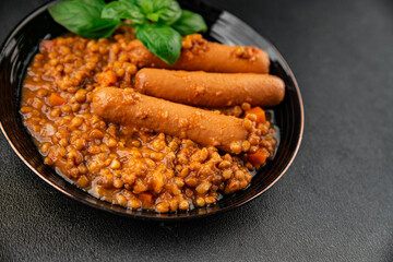 Sausage with lentils second course tasty snack fresh delicious gourmet food background on the table rustic top view copy space