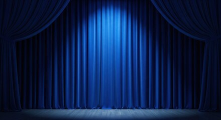 Luxurious blue theater curtain drapes elegantly. Folds of fabric create rich texture. Dramatic stage lighting enhances depth, richness of blue color