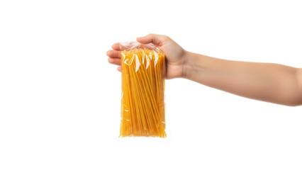 Hand holding a bag of uncooked spaghetti isolated on a transparent background pasta