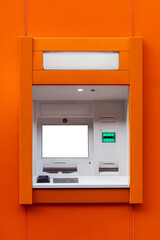 Bright orange wall with a modern service window featuring a blank screen, illuminated interior, and control panel, ideal for showcasing design concepts or mockups with copy space