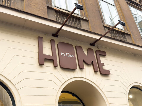 Zagreb, Croatia - December 14, 2025: HOME by Ciss store sign on a building facade, showcasing modern design elements and inviting atmosphere for home decor enthusiasts