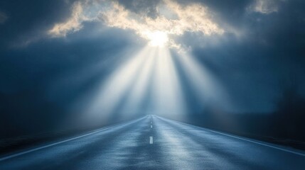 Sunbeams piercing clouds over highway