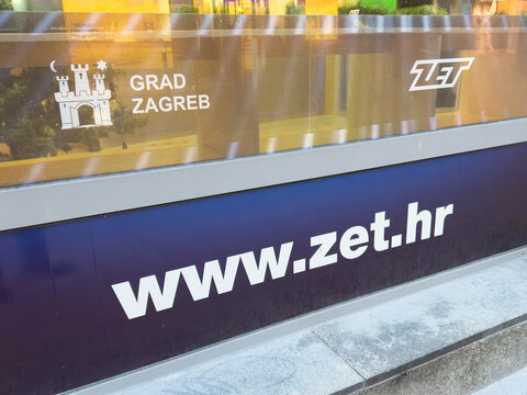 Zagreb, Croatia - December 14, 2025: ZET public transport sign in Zagreb, Croatia, showcasing the website and city branding, emphasizing urban mobility and connectivity
