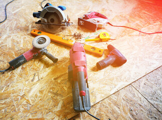 Construction tool for woodworking. Woodworking tool. Finishing carpentry tools. Hand tool for a wooden furniture. Woodworking tool, construction tools. Saw, grinding machine, angle grinder, jigsaw.