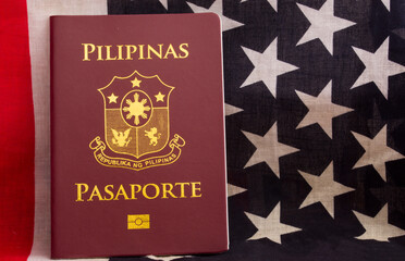 passport of the Philippines on the background of the flag of the United States