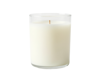 A glass filled with milk and a candle placed inside