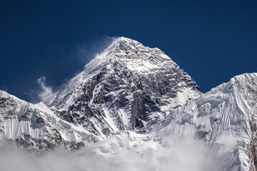 Mt. Everest, the highest mount in the world, summit behind Nuptse slope. View from Kala Patthar mountainside, Everest base camp trek, Nepal.