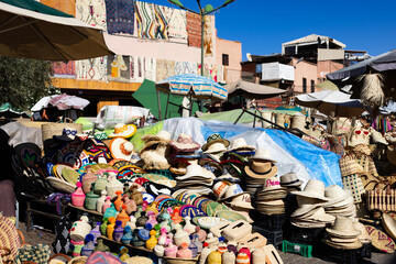 MARRAKESH, MOROCCO - DECEMBER 4, 2025: Locals and tourists going on with their daily business in Marrakesh old medina streets and traditional markets, part of Unesco world heritage