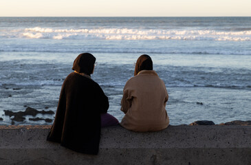 CASABLANCA, MOROCCO - DECEMBER 6, 2025: waiter pouring maroccan tea  in Casablance