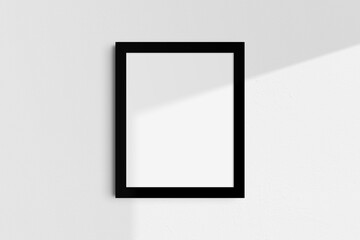 Frame mockup 4:5, 8x10. Single black frame mockup. Clean, modern, minimalist, bright. Portrait. Vertical. Shadow overlay.