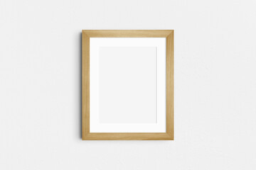Frame mockup 4:5. Single oak wood frame mockup. Clean, modern, minimalist, bright. Portrait. Vertical. Passepartout/mat opening in 3:4 aspect ratio.