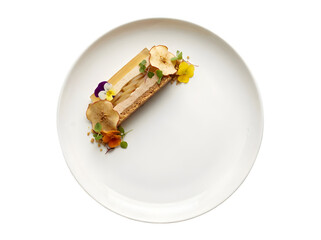 A Delectable Slice of Dessert Elegantly Plated with Floral Garnish and Artistry