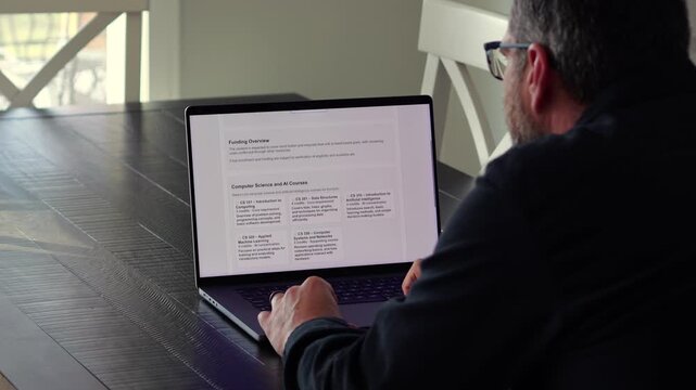 Middle Aged Man Completing College University Enrollment for Software Engineering Computer Science with Concentration in Artifical Intelligence