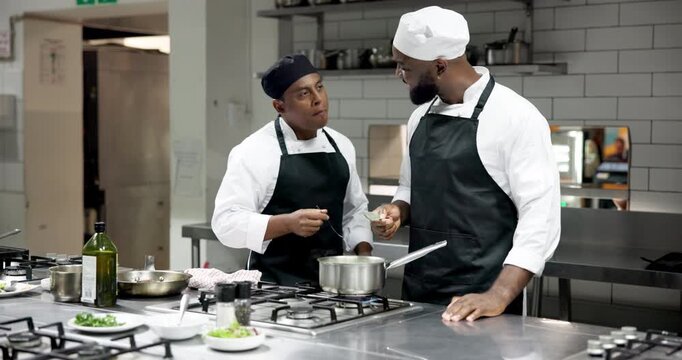 Restaurant, chef and men with test in kitchen for culinary skills, cuisine and learning for cooking. Hospitality, catering and people with pot to taste sauce for meal preparation, dinner and food