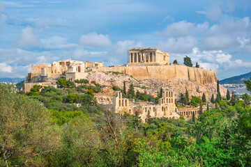 Fototapeta premium The ancient Acropolis on Acropolis Hill in Athens, Greece, with the Parthenon, Erechtheion, Propylaea, Temple of Athena Nike and Odeon of Herodes Atticus in view.
