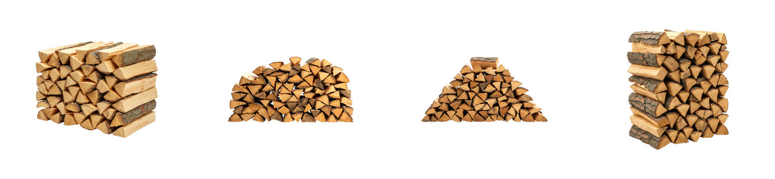 Set of four chopped firewood piles with natural bark, neatly stacked in various geometric shapes including a rectangle, arch, triangle, and a tall column