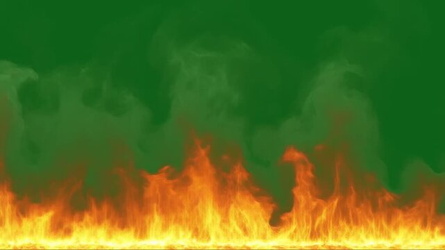 Realistic wall of fire flames burning on green screen background with rising smoke
