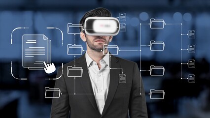 A man wearing virtual reality glasses interacts with digital documents in a modern office. This image symbolizes the evolution of technology and data engagement in business environments. Raster