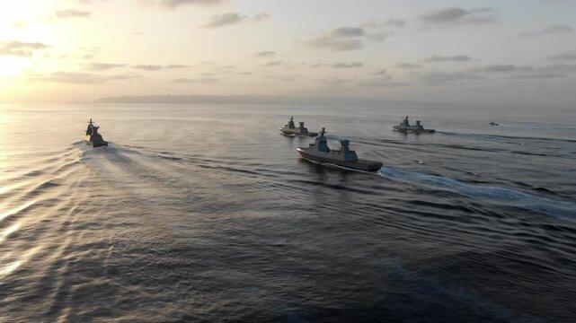 Israeli Navy Sa'ar 6 Corvettes Formation

Aerial view of Israeli Navy Sa'ar 6 class corvettes sailing in coordinated formation at sea during operations, Israel.
