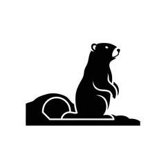 A black bear illustration sitting on a mound, looking up, in a simple graphic style, resembling a silhouette.