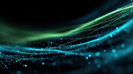 Abstract flow of glowing blue and green particles on dark background