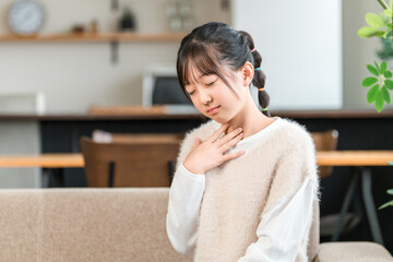 Elementary and junior high school girls complaining of sore throats (cold, flu)