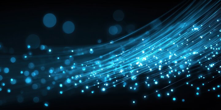 Abstract Blue Light Trails and Glowing Particles on Dark Background