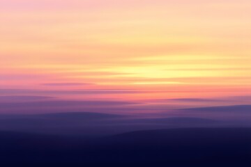 Obraz premium Vibrant Sunset over Mountains with Orange Pink and Purple Sky