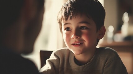 Intimate moment between a father and son sharing a heartfelt conversation at home