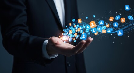 Businessmans hand releasing glowing social network icons connected by data streams on a dark digital background