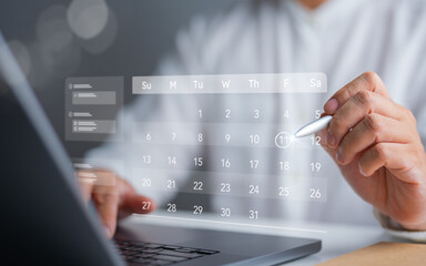 Time management concept showing a virtual calendar where business people plan appointments, action...