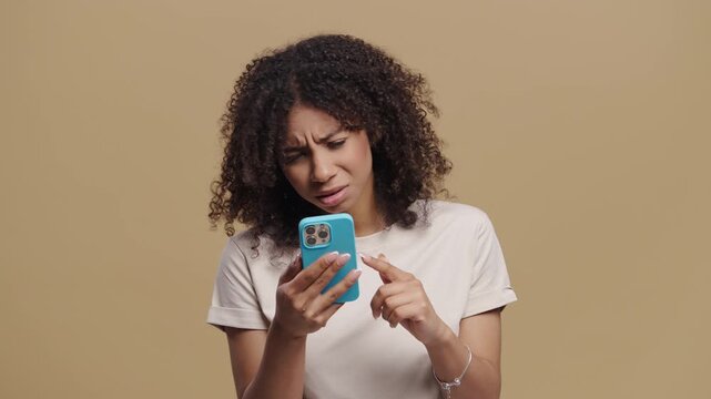 Bored Indifferent African Teenage Girl Scrolling Social Networks, Smartphone,Internet Addiction