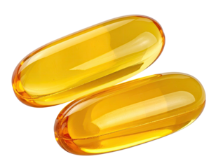 Two translucent, oblong, golden capsules, a health supplement