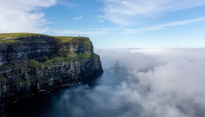 coastal cliffs disappearing into sea fog, minimal horizon visibility