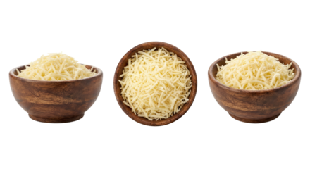 Three wooden bowls filled with finely shredded cheese arranged symmetrically against a black