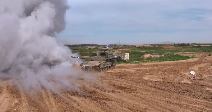 Merkava Tank Deploying Smoke Screen Near Gaza Border

Short footage showing a Merkava tank creating a smoke screen near the Gaza border during military activity.

