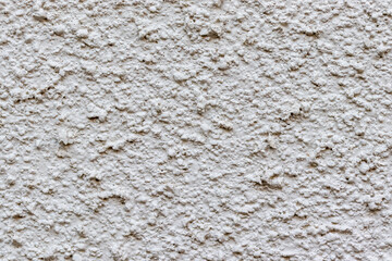 ざらざらした表面の白い壁