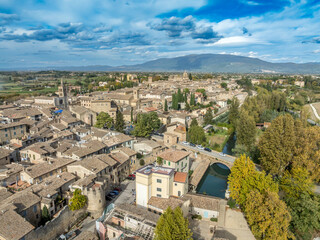 Aerial view of Bevagna Italy with medieval walls, washhouse on the Clitunno river