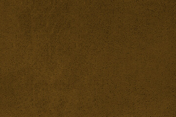 dark brown yellow stone stucco in plaster  wall texture background for interior or exterior design concept colour  color