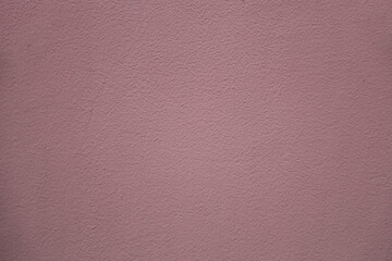 Fototapeta premium Close-up of a purple violet painted wall with texture rough surface Beautiful purple painted modern wall texture, different purple tones, purple background