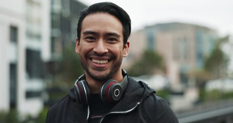 Fitness, man and face in city with smile, headphones and check smart watch for progress or distance. Good energy, athlete and portrait on bridge for exercise, wellness and tech for time in Brazil - Powered by Adobe