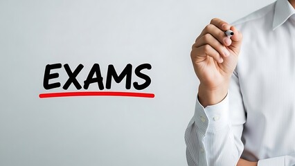 Businessman writing the word exams with a red underline on a white board for education concepts