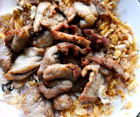Thai Fried chopped pork   with garlic, Thai famous street food.