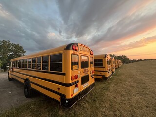 Yellow buses parked at sunset - Bus jaunes gar&eacute;s au coucher de soleil