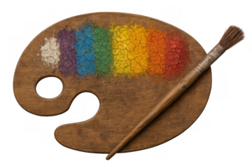 Wooden art palette with an artist's paintbrush and vibrant rainbow colors painted, expressing creativity and inspiration