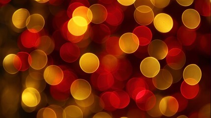 Close-up of out-of-focus, circular lights with a warm palette, creating a vibrant, abstract background. Blurs include yellow and red hues