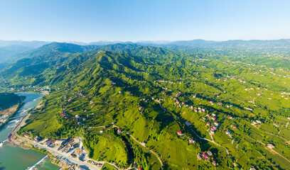 Ardeshen, Turkey. Mountains covered with green vegetation. Firtina River Valley. Summer sunny morning. Panorama. Aerial view